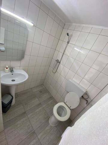 Фото номера Бюджетный двухместный номер с 2 отдельными кроватями Гостевой дом Pensiunea Bavaria Campina г. Кымпина 6